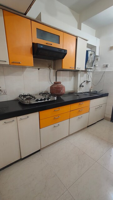 Kitchen in 2 BHK Apartment at Satellite Garden, Goregaon East – for Rent