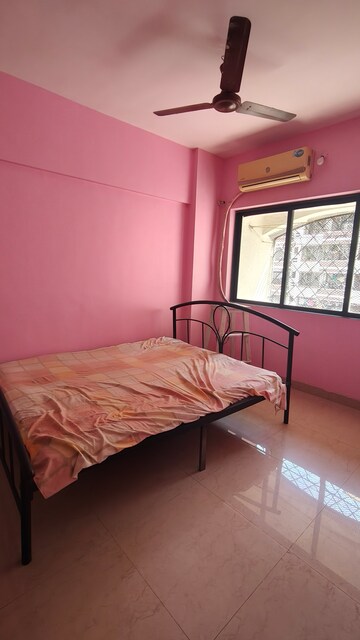 Bedroom in 2 BHK Apartment at Satellite Garden, Goregaon East – for Rent