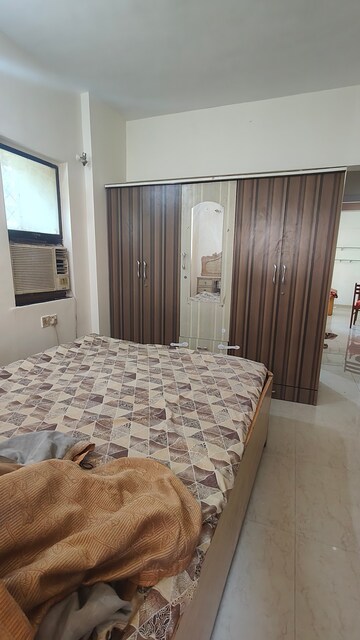 Bedroom in 2 BHK Apartment at Satellite Garden, Goregaon East – for Rent