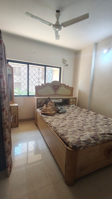 Bedroom in 2 BHK Apartment at Satellite Garden, Goregaon East – for Rent