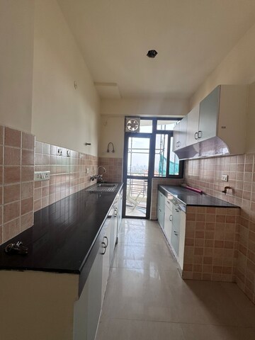 Kitchen in 2 BHK Apartment at Angel Mercury, Vaibhav Khand – for Rent