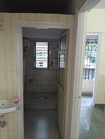 Bathroom in 2 BHK Apartment at Himgiri Lokupvan Phase II CHS Ltd, Vasant Vihar – for Rent
