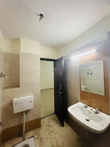 Bathroom in 3 BHK Apartment at HIG Apartments, Omicron I Greater Noida – for Sale