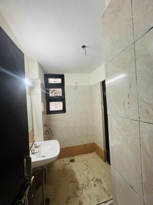Bathroom in 3 BHK Apartment at HIG Apartments, Omicron I Greater Noida – for Sale