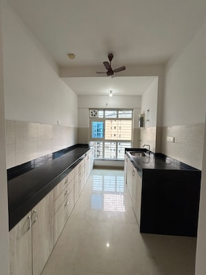 Kitchen in 3 BHK Apartment at Wadhwa TW Gardens, Kandivali East – for Sale
