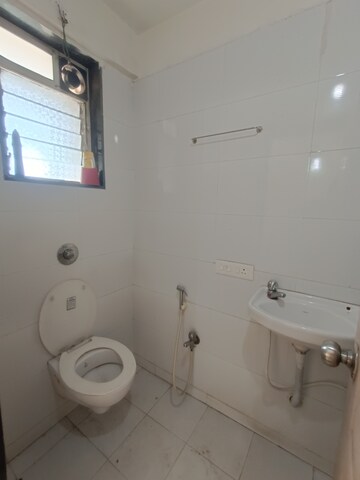 Bathroom in 3 BHK Apartment at Gahlot Majesty and Avenue CHS, Seawoods – for Rent