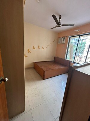 Bedroom in 4 BHK Apartment at Thakur Jewel Tower, Kandivali East – for Sale