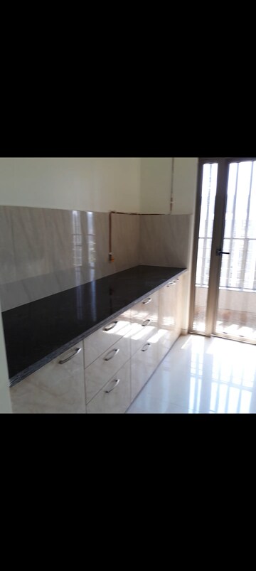 Kitchen in 2 BHK Apartment at Kalpataru Paramount, Kapur Bawdi – for Rent