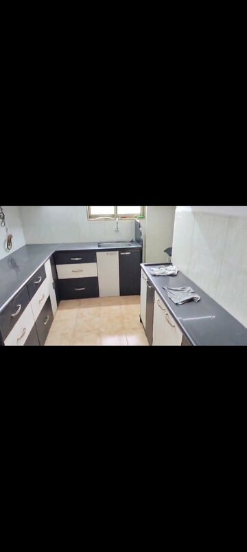 Kitchen in 2.5 BHK Apartment at Runwal Garden City, Balkum Pada – for Rent
