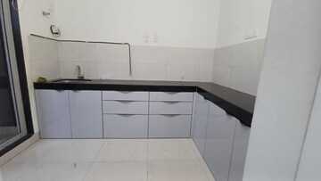 Kitchen in 2 BHK Apartment at Ashar Metro Towers, Vartak Nagar – for Rent