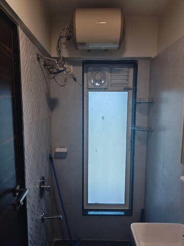 Bathroom in 3 BHK Apartment at Lotus Sky Garden, Malad West – for Rent