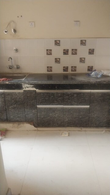 Kitchen in 2 BHK Apartment at Eureka Diya Green City, Raj Nagar Extension – for Sale