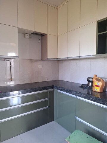 Kitchen in 2 BHK Apartment at Cosmos Habitat, Majiwada – for Rent