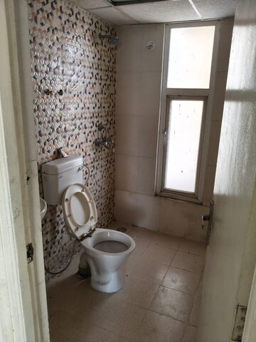 Bathroom in 2 BHK Apartment at Nilaya Greens, Raj Nagar Extension – for Sale