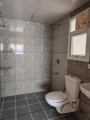 Bathroom in 3 BHK Apartment at Godrej Meridien, Sector 106 – for Sale