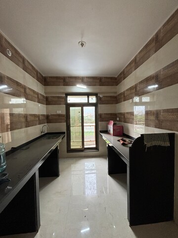 Kitchen in 2 BHK Apartment at National Harmony, New Panvel – for Sale