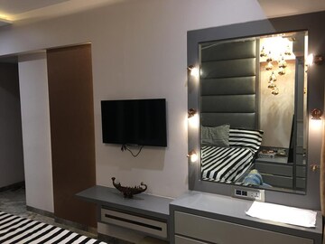 Living Room in 2 BHK Apartment at Transcon Triumph Tower, Andheri West – for Rent