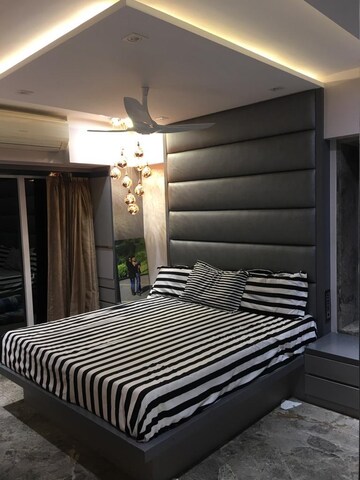 Bedroom in 2 BHK Apartment at Transcon Triumph Tower, Andheri West – for Rent