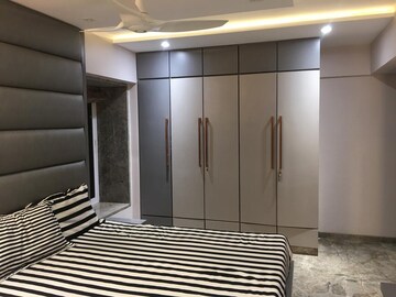 Bedroom in 2 BHK Apartment at Transcon Triumph Tower, Andheri West – for Rent