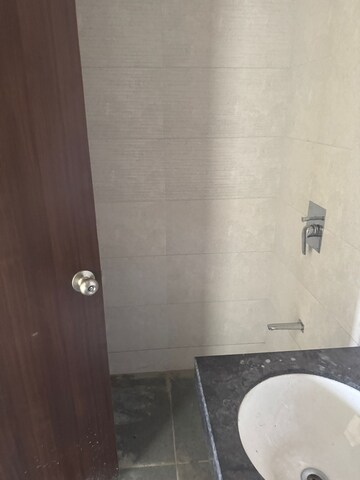 Bathroom in 2 BHK Apartment at Piramal Vaikunth, Balkum Pada – for Rent