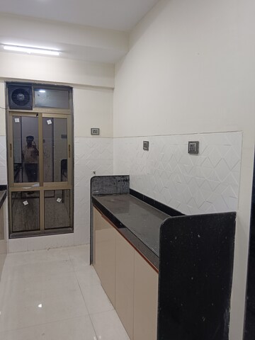 Kitchen in 2 BHK Apartment at Shiv Shakti Tower 28, Malad East – for Rent
