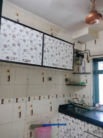 Kitchen in 1 BHK Apartment at Purushottam Plaza, Kasarvadavali – for Rent