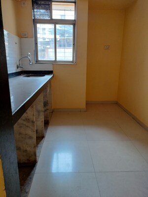 Kitchen in 1 BHK Apartment at Rosa Classique, Kasarvadavali – for Sale