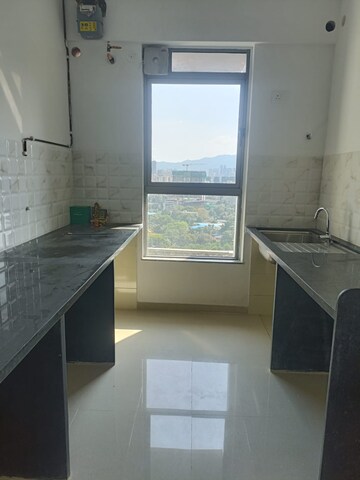 Kitchen in 2 BHK Apartment at Kalpataru Immensa, Kolshet Road – for Rent
