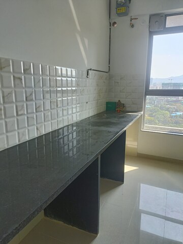 Kitchen in 2 BHK Apartment at Kalpataru Immensa, Kolshet Road – for Rent