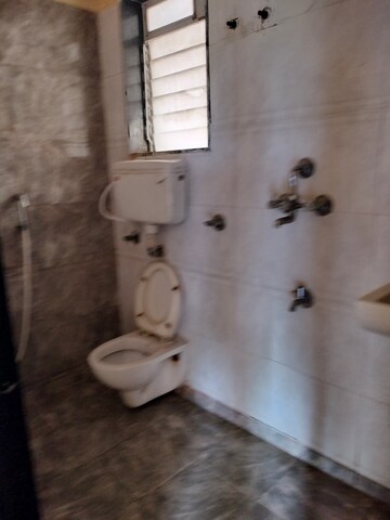Bathroom in 1 BHK Apartment at Rosa Classique, Kasarvadavali – for Sale