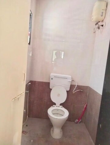 Bathroom in 2 BHK Apartment at Anuj Co-Op Housing Society, Wadgaon Sheri – for Rent