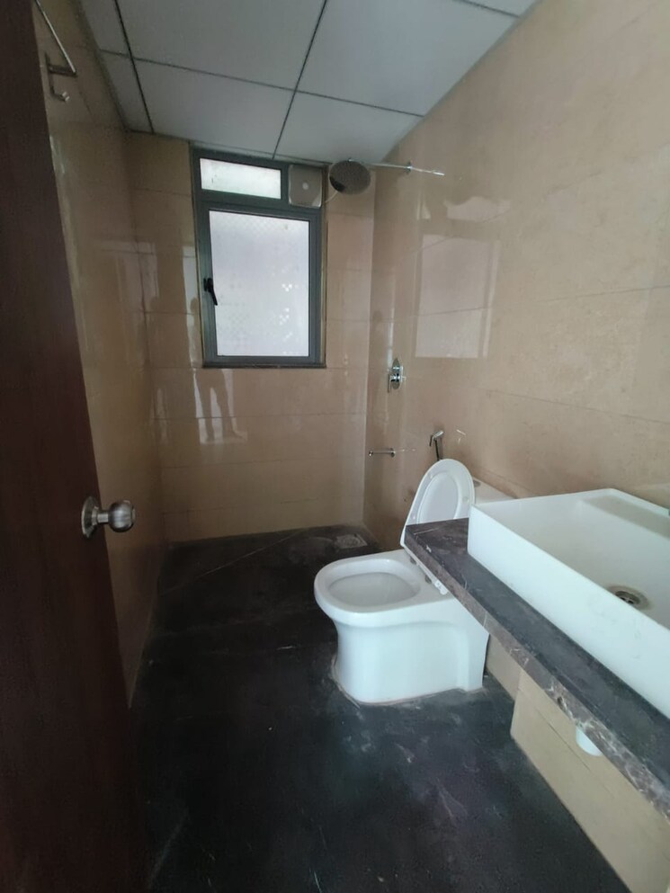 Bathroom, kalpataru-immensa-c 2 Bedroom 706 Sq.Ft. Apartment In Kolshet Road Thane 8647497