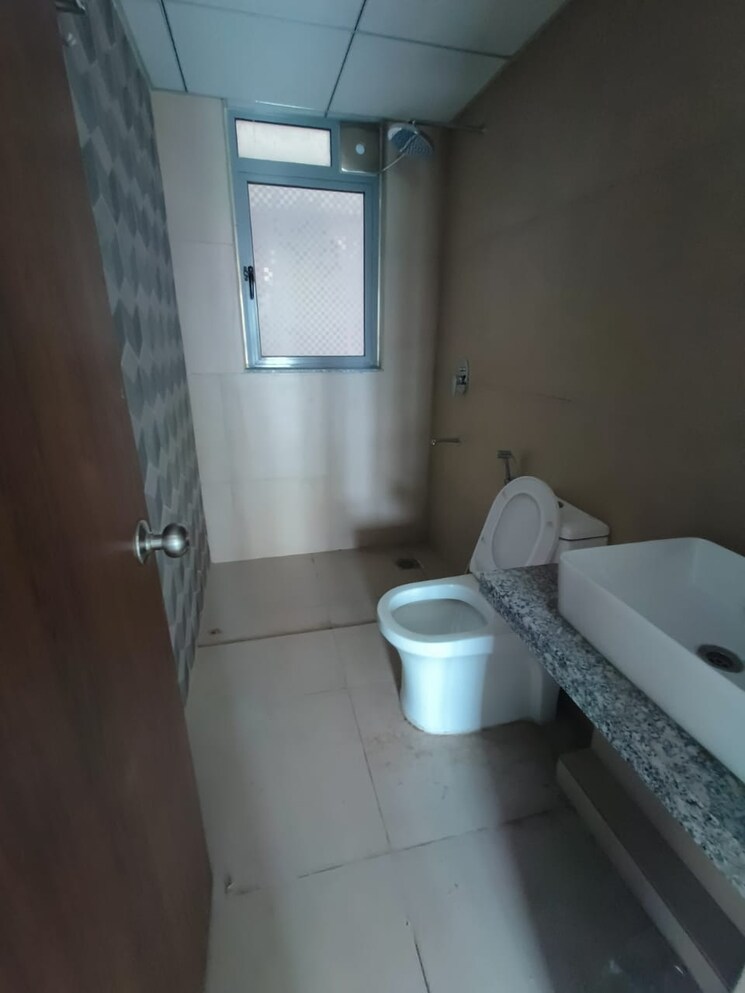 Bathroom, kalpataru-immensa-c 2 Bedroom 706 Sq.Ft. Apartment In Kolshet Road Thane 8647497
