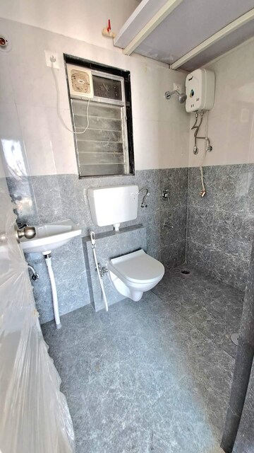 Bathroom in 1 BHK Apartment at Mayfair Sara Virar, Virar West – for Rent