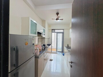 Kitchen in 1.5 BHK Apartment at Piramal Vaikunth, Balkum Pada – for Rent