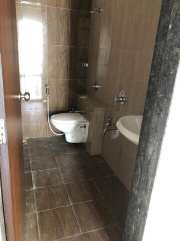 Bathroom in 1 BHK Apartment at KIPL Morya, Kasarvadavali – for Rent