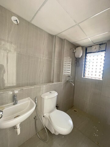 Bathroom in 1 BHK Apartment at Runwal Gardens Phase I, Dombivli East – for Rent