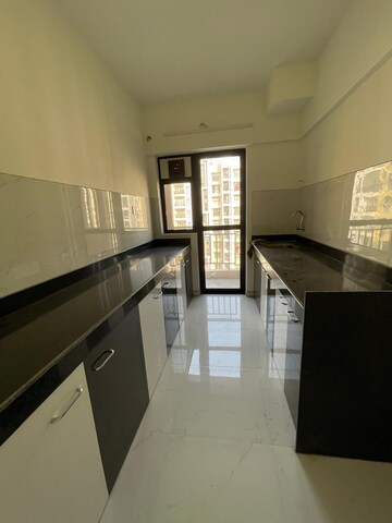 Kitchen in 3 BHK Apartment at Runwal Gardens Phase 2, Dombivli East – for Rent