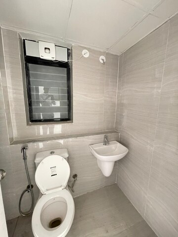 Bathroom in 3 BHK Apartment at Runwal Gardens Phase 2, Dombivli East – for Rent