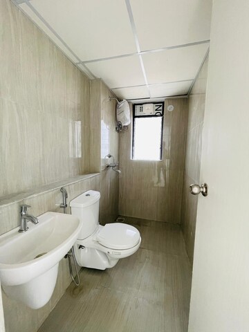 Bathroom in 3 BHK Apartment at Runwal Gardens Phase 2, Dombivli East – for Rent