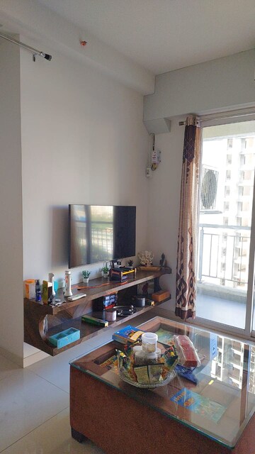 Living Room in 2 BHK Apartment at Godrej Emerald, Ghodbunder Road – for Rent