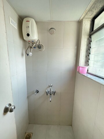 Bathroom in 1 BHK Apartment at Lodha Palava Crown, Dombivli East – for Sale
