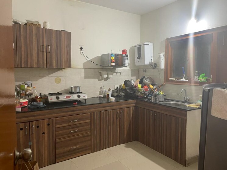 Kitchen, theme-ambience-golf-view 2 Bedroom 1395 Sq.Ft. Apartment In Gachibowli Hyderabad 8648141