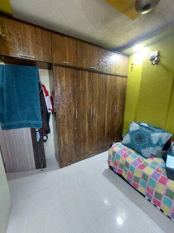 Bedroom in 1.5 BHK Apartment at Golden Palace CHS, Kandivali East – for Sale