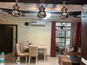 Living Room in 2 BHK Apartment at Spring Meadows, Tech Zone 4 Greater Noida – for Sale