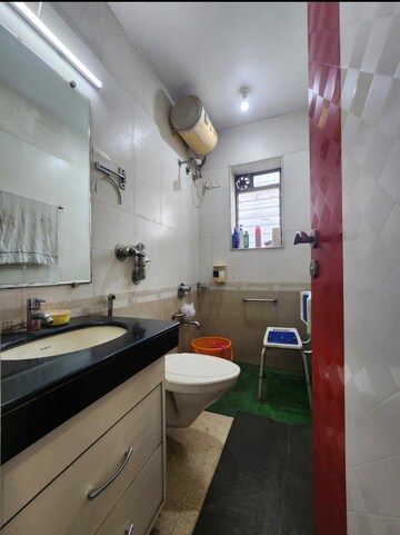 Kitchen in 1.5 BHK Apartment at Living Essence, Kandivali East – for Sale