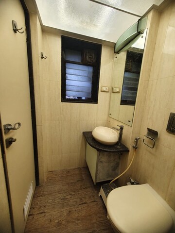Bathroom in 2 BHK Apartment at Hubtown Akruti Orchid Park, Sakinaka – for Rent