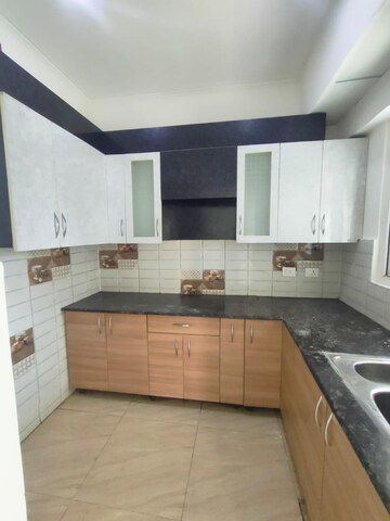 Kitchen in 3 BHK Apartment at Amrapali Golf Homes, Sector 4 Greater Noida – for Rent