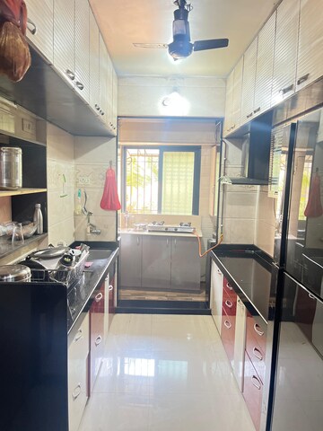 Kitchen in 2 BHK Apartment at Raunak Unnathi Gardens, Pokhran Road No One – for Sale
