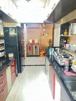 Kitchen in 2 BHK Apartment at Raunak Unnathi Gardens, Pokhran Road No One – for Sale